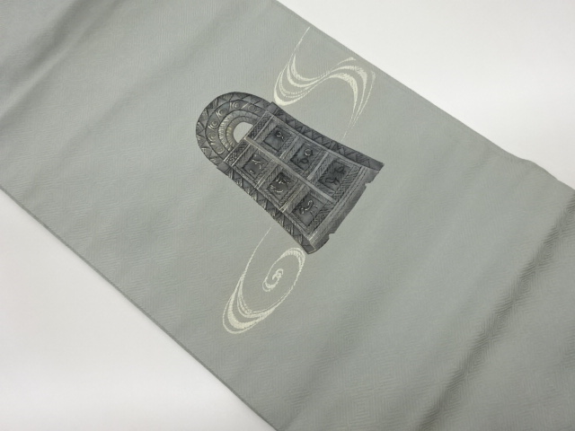 金彩手描き曲線に銅鐸模様名古屋帯